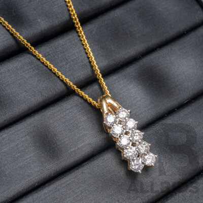 18ct Yellow Gold Diamond Pendant with Gold Tone Necklace - 1.89gms