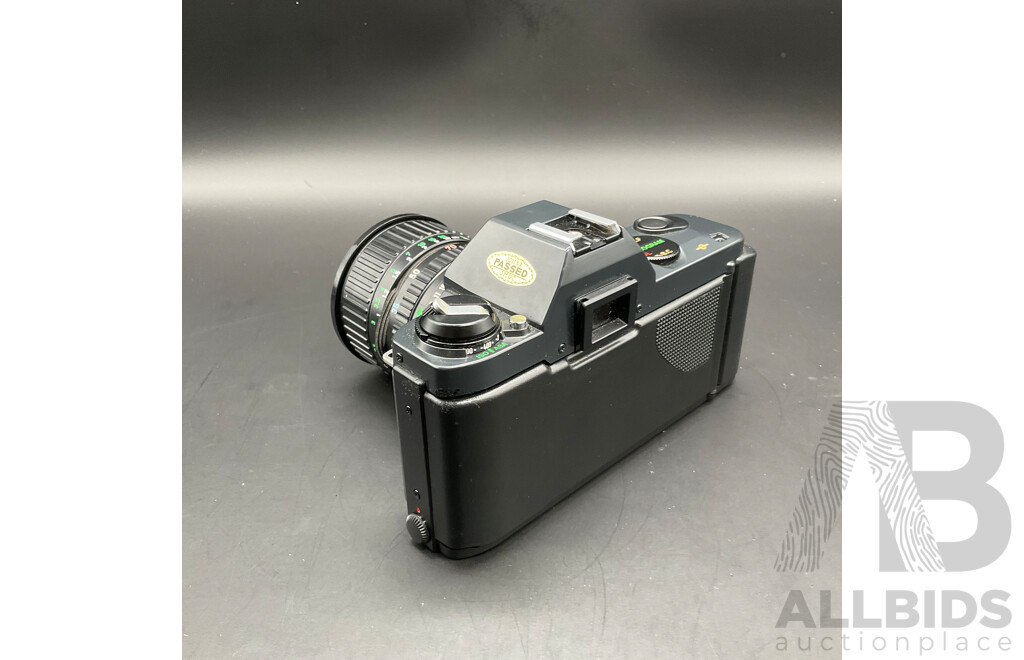 CANON T50 Film Camera with 35-70mm Lens and Cover and TOKINA SD 70-210mm Lens