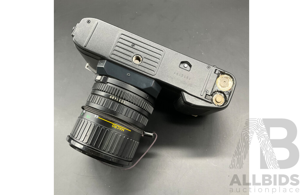 CANON T50 Film Camera with 35-70mm Lens and Cover and TOKINA SD 70-210mm Lens