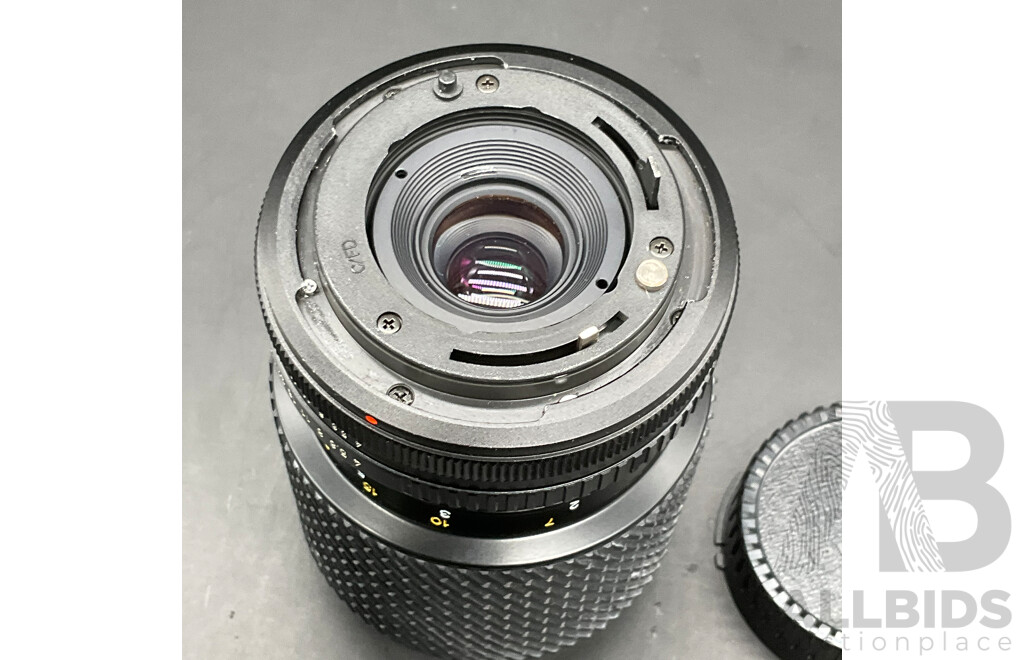 CANON T50 Film Camera with 35-70mm Lens and Cover and TOKINA SD 70-210mm Lens