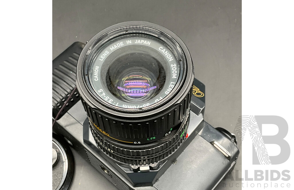 CANON T50 Film Camera with 35-70mm Lens and Cover and TOKINA SD 70-210mm Lens
