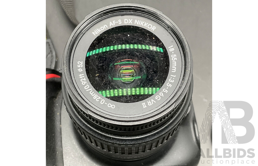NIKON D5100 Digital SLR Camera with NIKON AF-S DX 18-55mm Lens and NIKON AF 28-105mm Macro Lens
