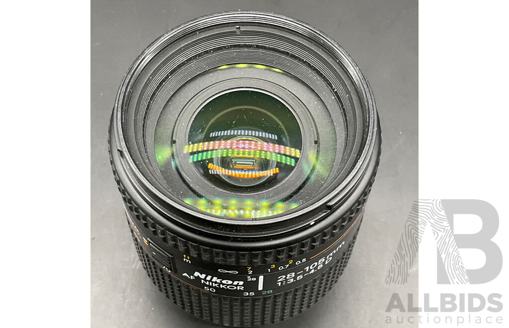 NIKON D5100 Digital SLR Camera with NIKON AF-S DX 18-55mm Lens and NIKON AF 28-105mm Macro Lens