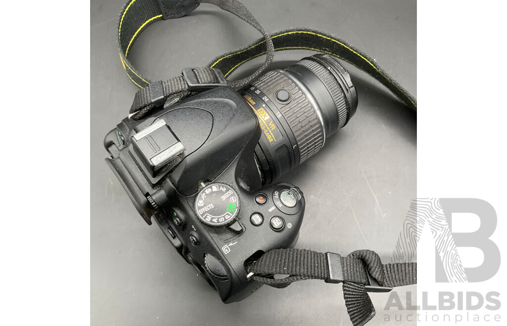 NIKON D5100 Digital SLR Camera with NIKON AF-S DX 18-55mm Lens and NIKON AF 28-105mm Macro Lens