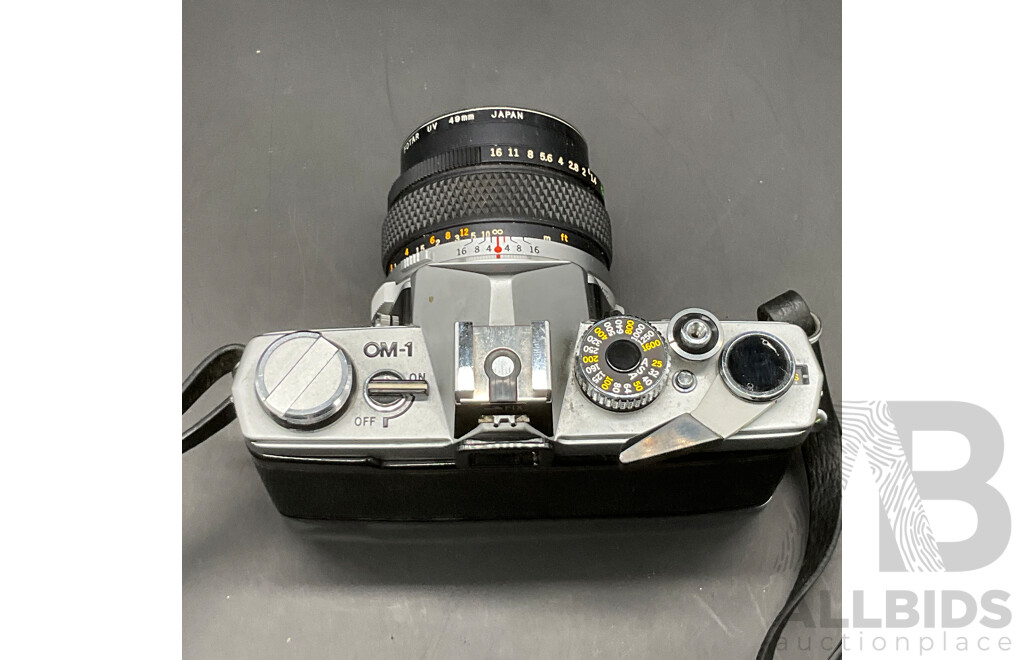 OLYMPUS OM-1 SLR Film Camera with G.Zuiko  50mm Lens and Case