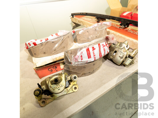 Collection of Eight NOS Genuine Holden Brake Shoes and Two PBR Brake Calipers