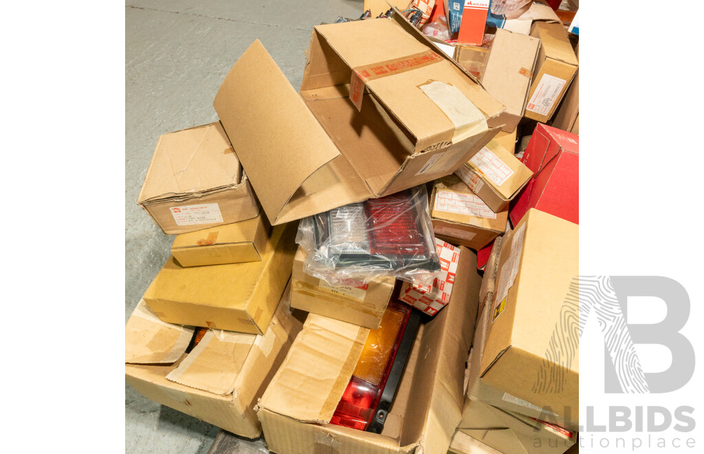 Pallet Lot of Various NOS Genuine GM Holden, Nissan and Isuzu Lenses