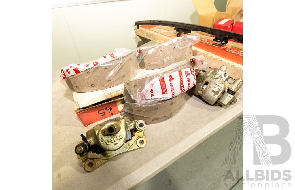 Collection of Eight NOS Genuine Holden Brake Shoes and Two PBR Brake Calipers