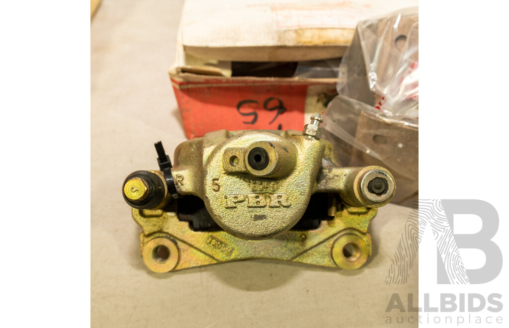 Collection of Eight NOS Genuine Holden Brake Shoes and Two PBR Brake Calipers
