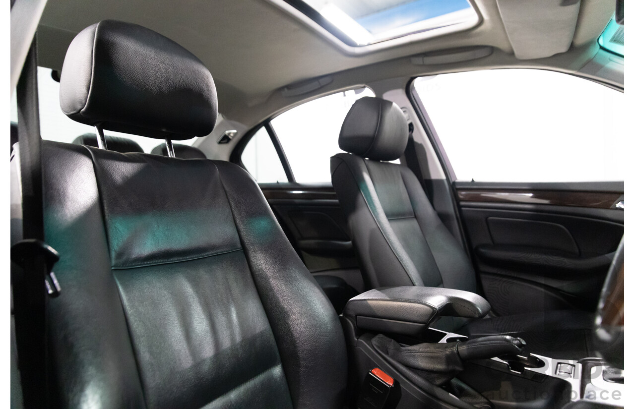 6/2002 BMW 330i E46 4d Sedan Orient Blue Metallic 3.0L