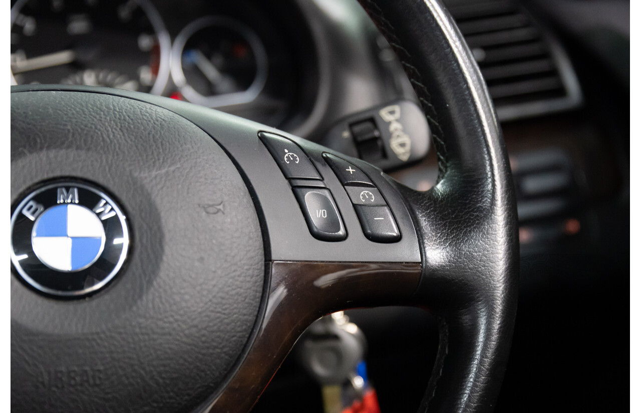 6/2002 BMW 330i E46 4d Sedan Orient Blue Metallic 3.0L