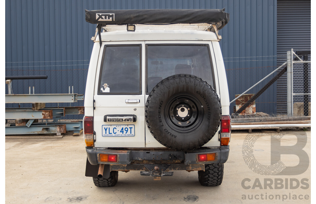 7/1992 Toyota Landcruiser Troopcarrier (4x4)  FJ75RV 2d Wagon White 4.0L