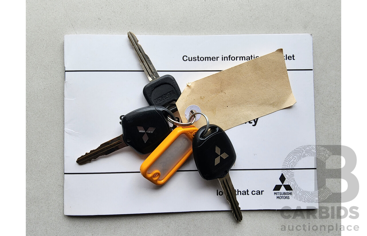 5/2015 Mitsubishi Triton GLS (4x4) MQ MY16 Dual Cab Utility White 2.4L