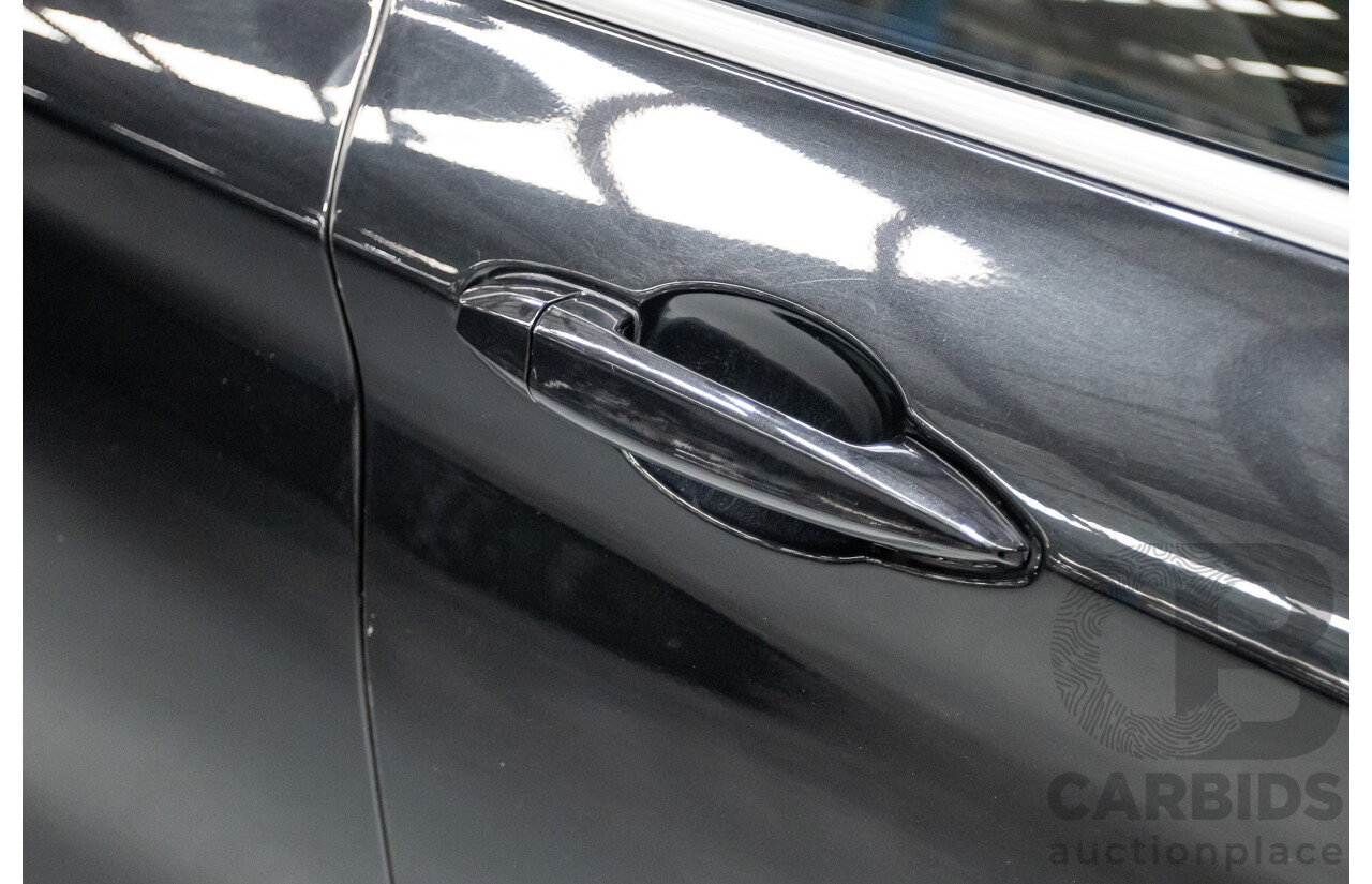 10/2015 BMW X1 xDrive20d (AWD) F48 4D Wagon Black Sapphire Metallic Turbo Diesel 2.0L