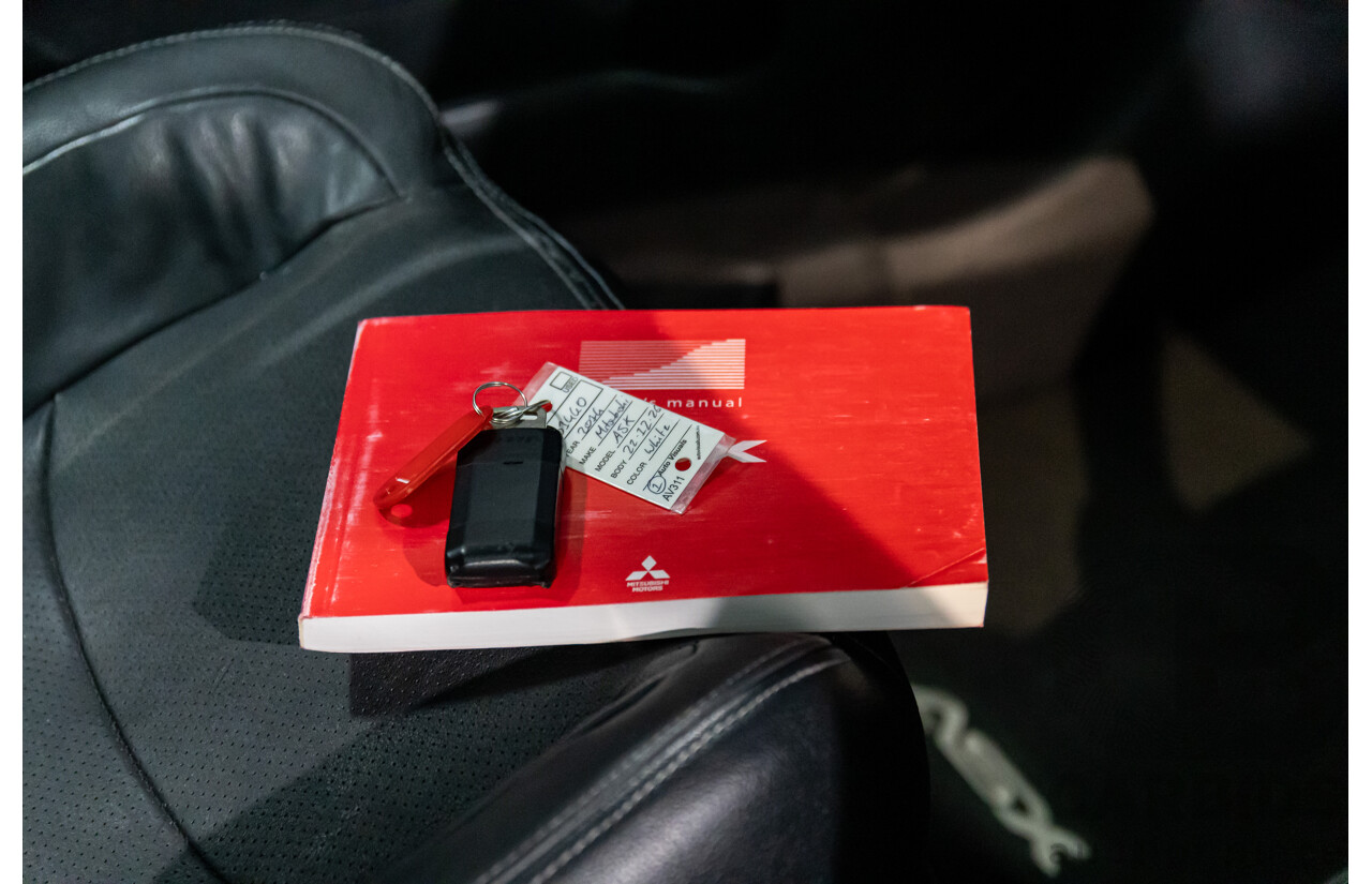 12/2014 Mitsubishi ASX XLS (AWD) XB MY15 4d Wagon Silky White Pearl Turbo Diesel 2.3L