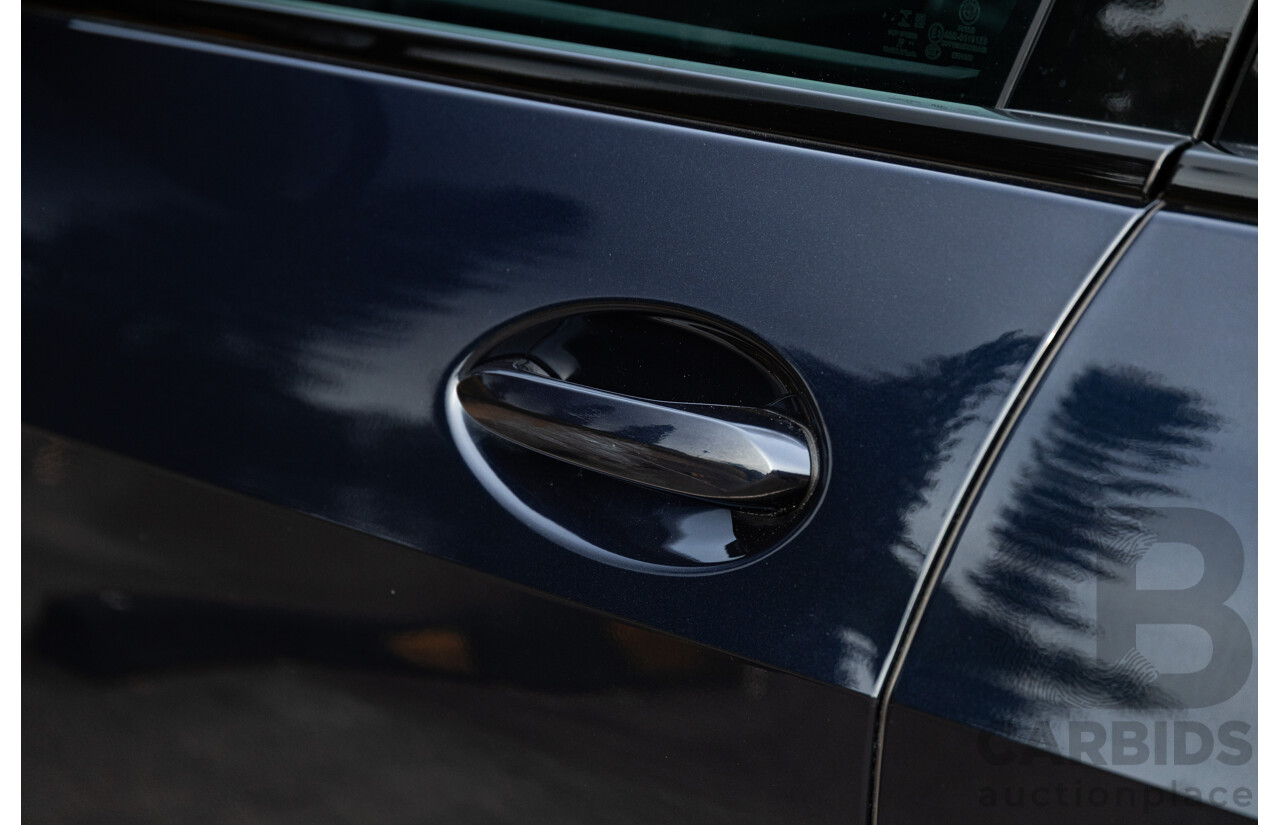 02/2021 Bmw X5 M50i (AWD) G05 MY21 4d Wagon Carbon Black Metallic Twin Turbo V8 4.4L