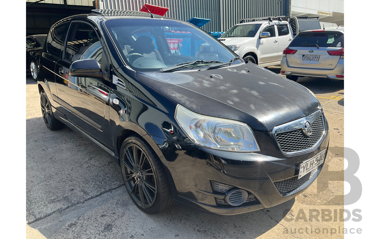 2/2010 Holden Barina TK MY10 3d Hatchback Black 1.6L