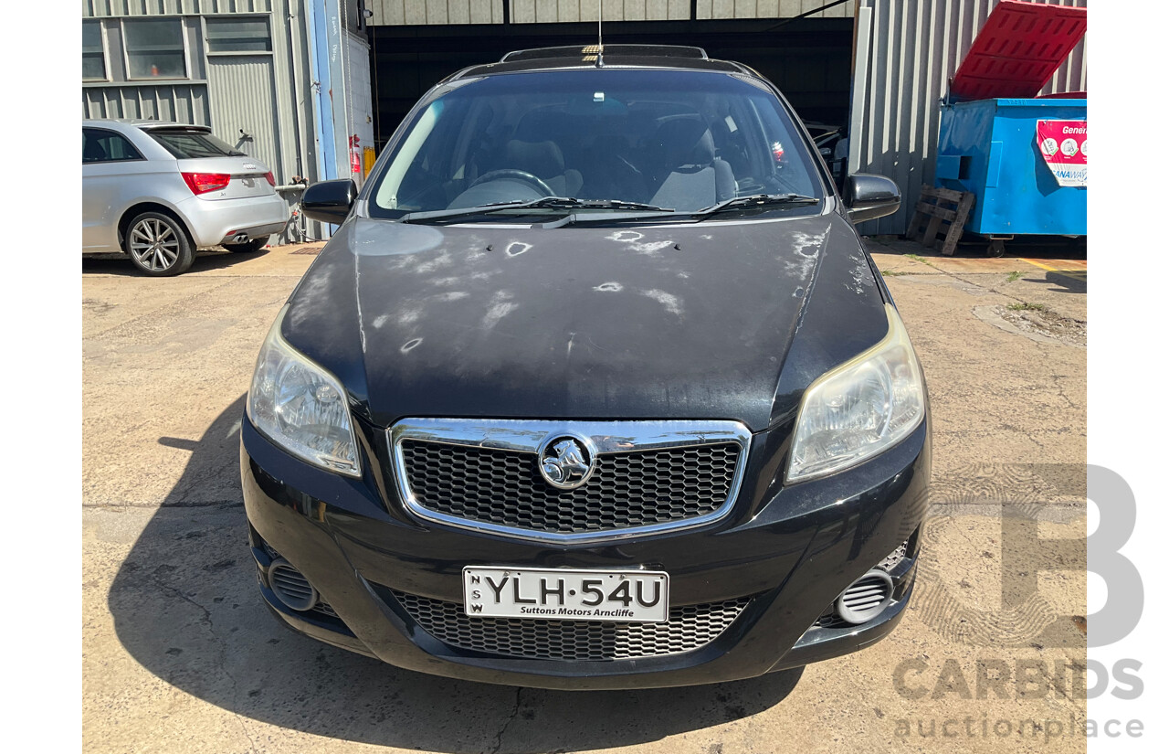 2/2010 Holden Barina TK MY10 3d Hatchback Black 1.6L