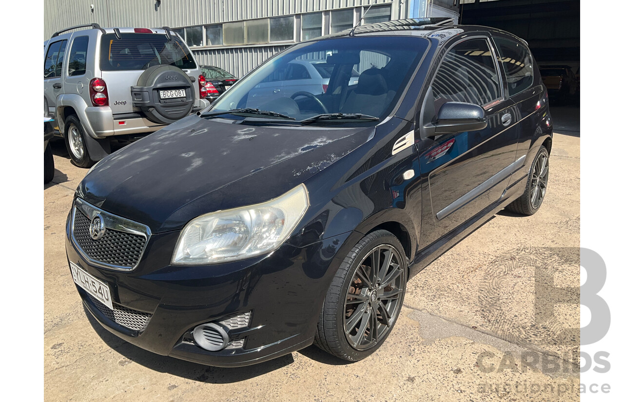 2/2010 Holden Barina TK MY10 3d Hatchback Black 1.6L
