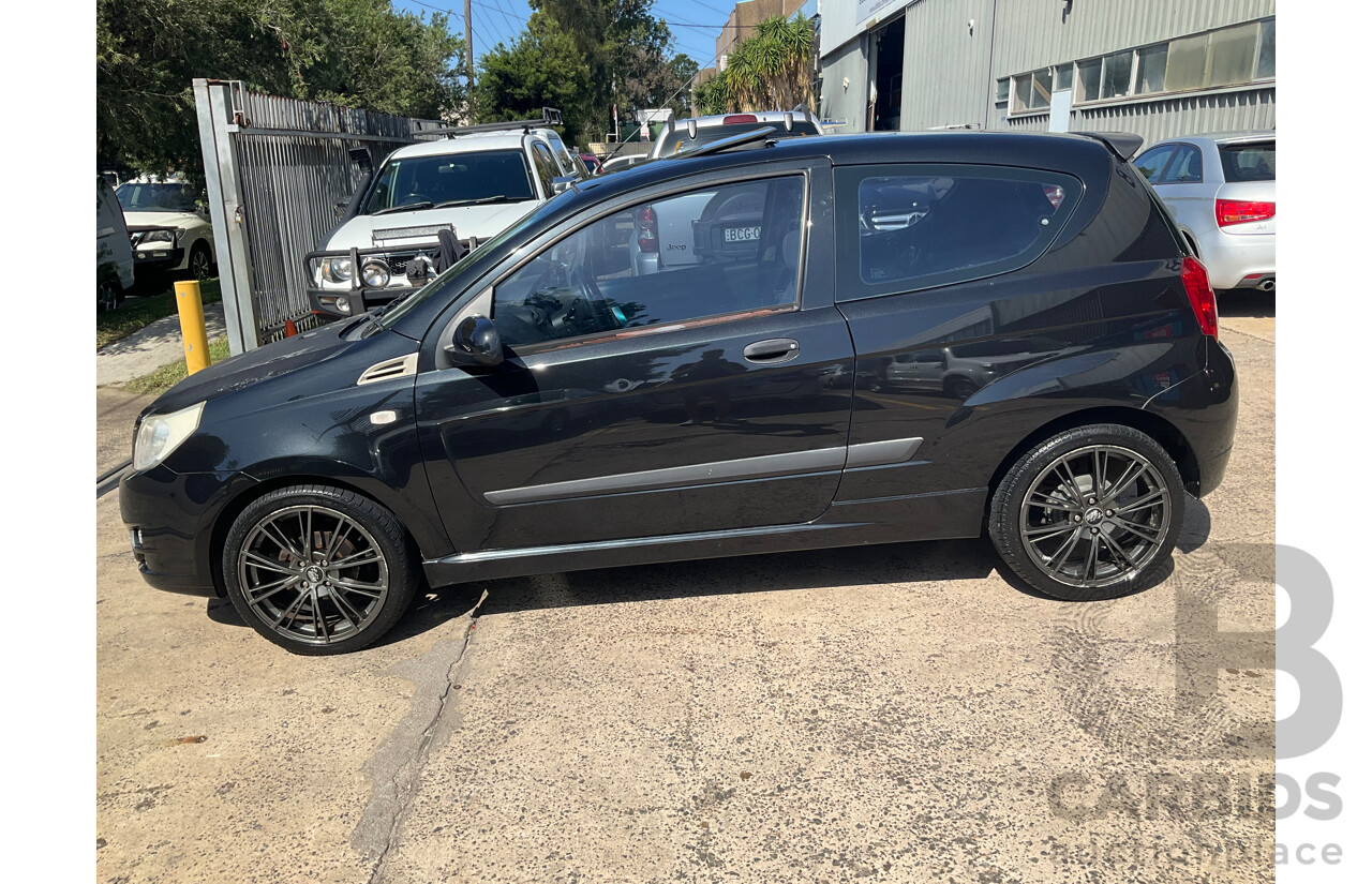 2/2010 Holden Barina TK MY10 3d Hatchback Black 1.6L