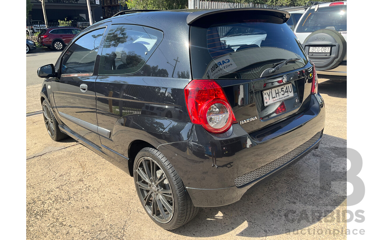 2/2010 Holden Barina TK MY10 3d Hatchback Black 1.6L