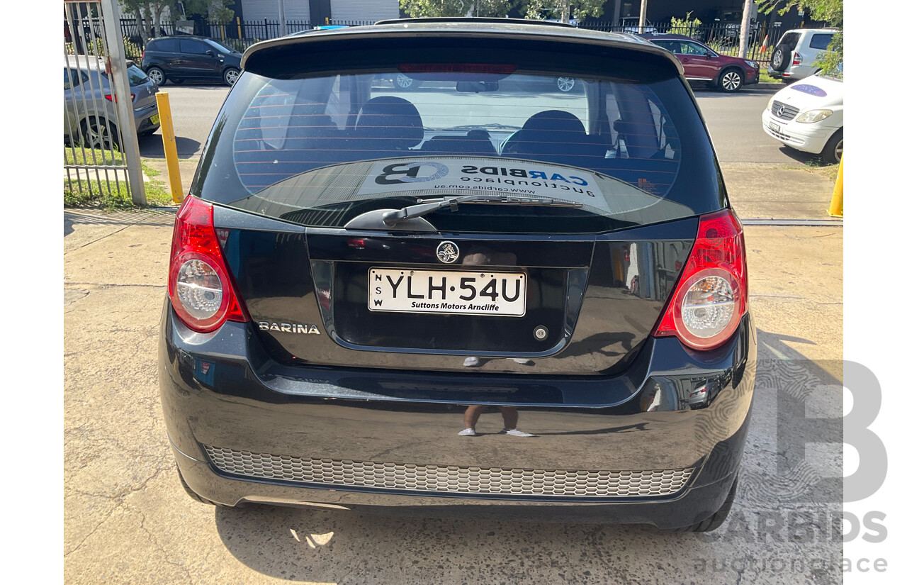 2/2010 Holden Barina TK MY10 3d Hatchback Black 1.6L