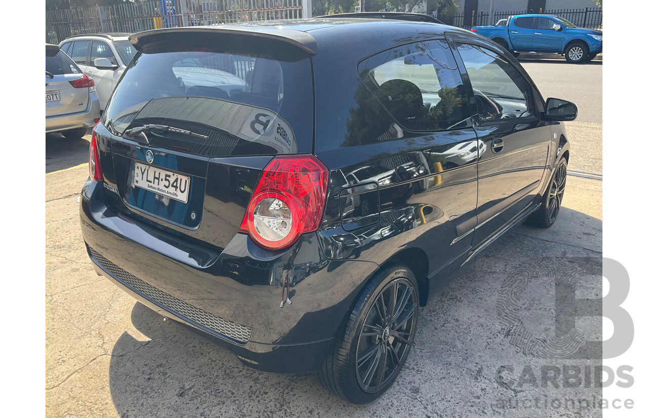 2/2010 Holden Barina TK MY10 3d Hatchback Black 1.6L