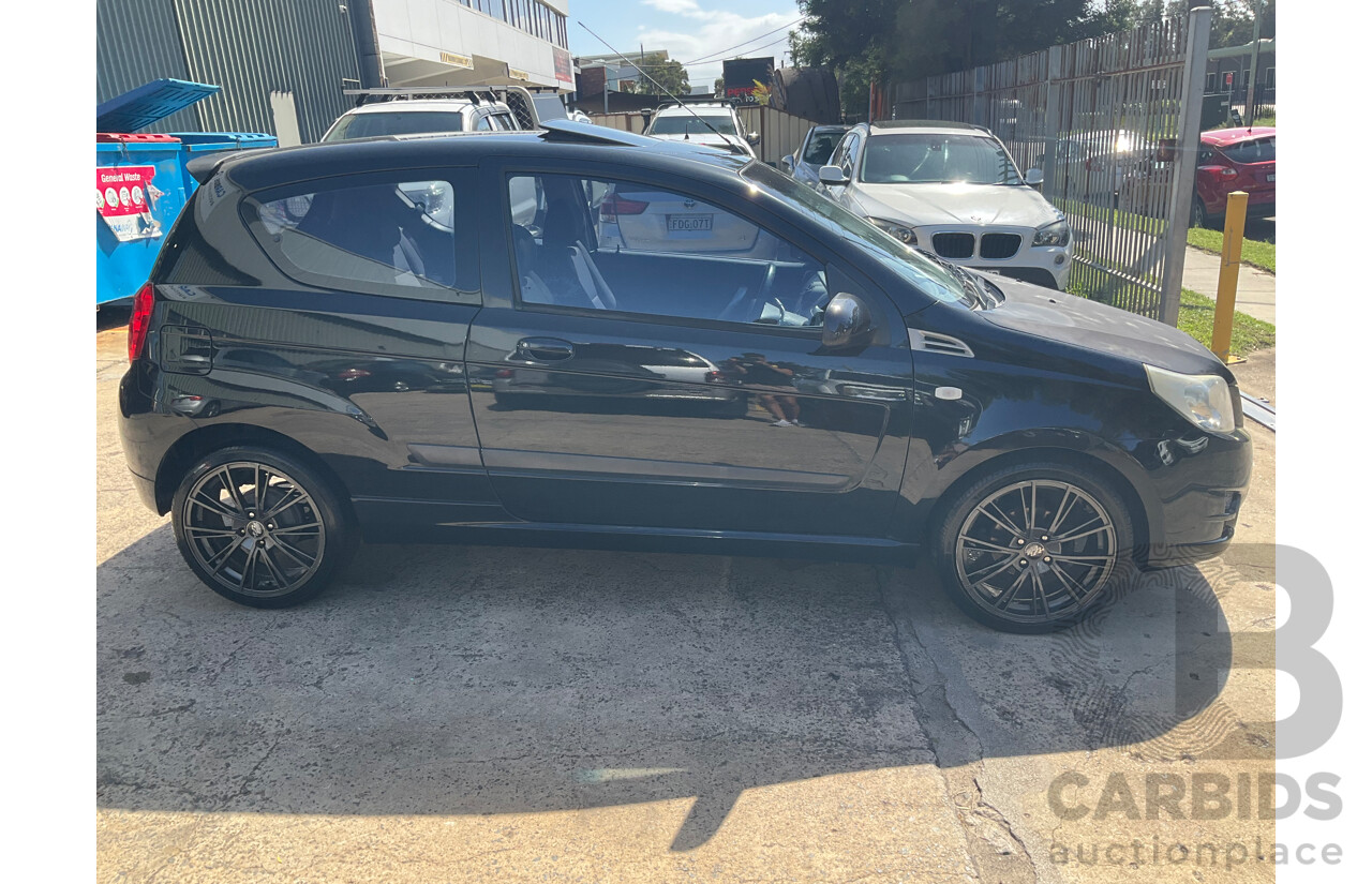 2/2010 Holden Barina TK MY10 3d Hatchback Black 1.6L