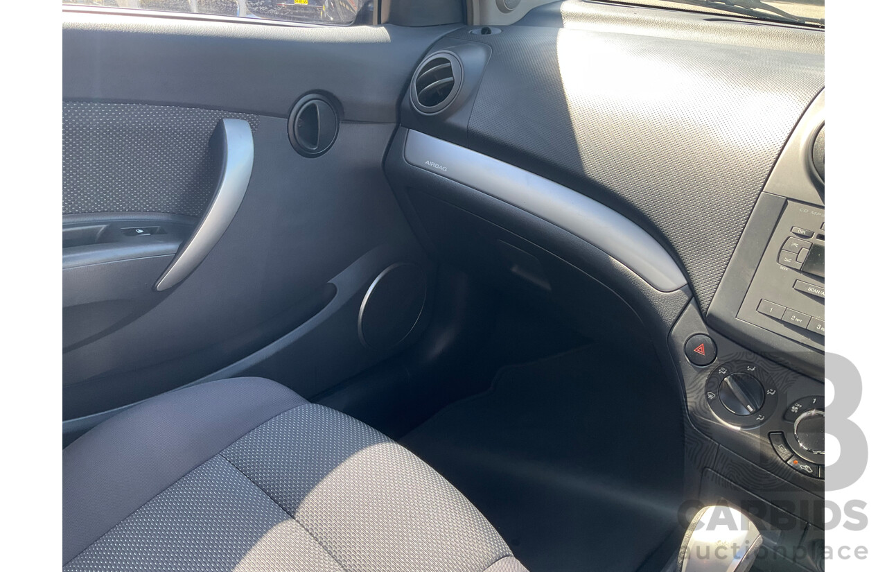 2/2010 Holden Barina TK MY10 3d Hatchback Black 1.6L