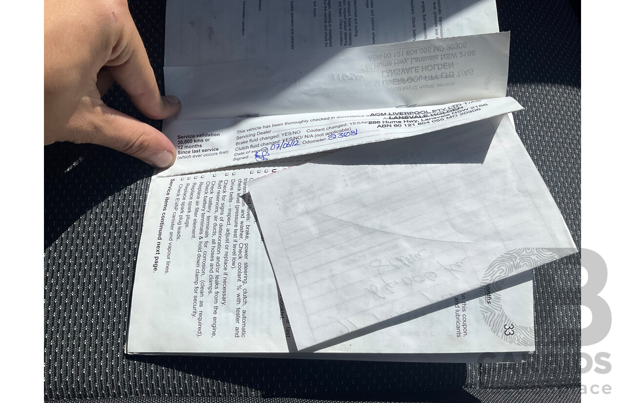 2/2010 Holden Barina TK MY10 3d Hatchback Black 1.6L