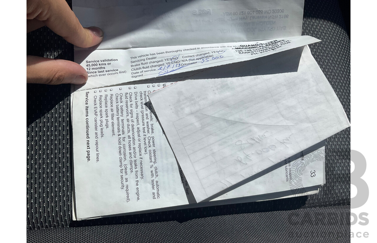 2/2010 Holden Barina TK MY10 3d Hatchback Black 1.6L