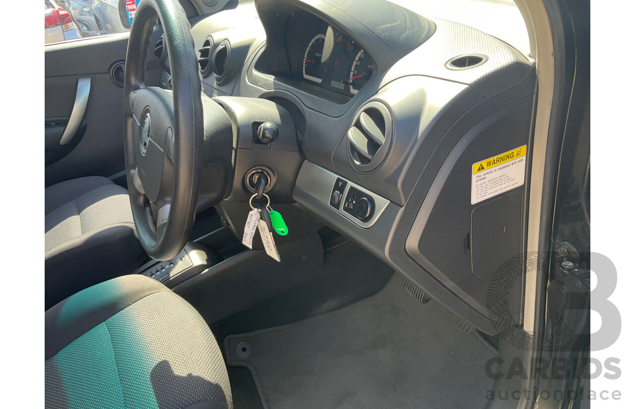 2/2010 Holden Barina TK MY10 3d Hatchback Black 1.6L