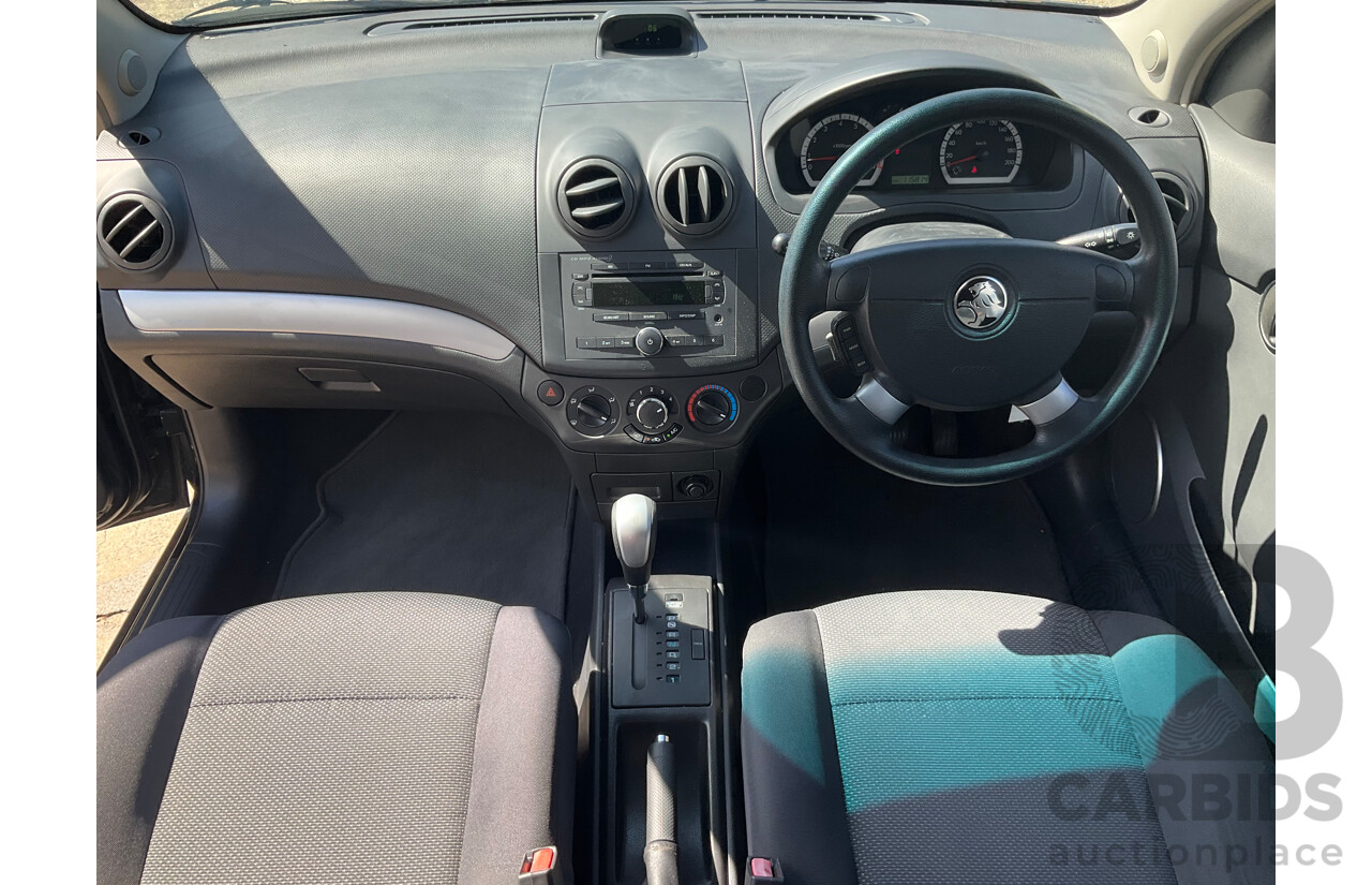 2/2010 Holden Barina TK MY10 3d Hatchback Black 1.6L