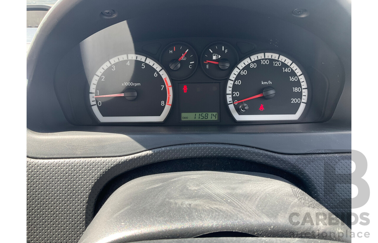 2/2010 Holden Barina TK MY10 3d Hatchback Black 1.6L