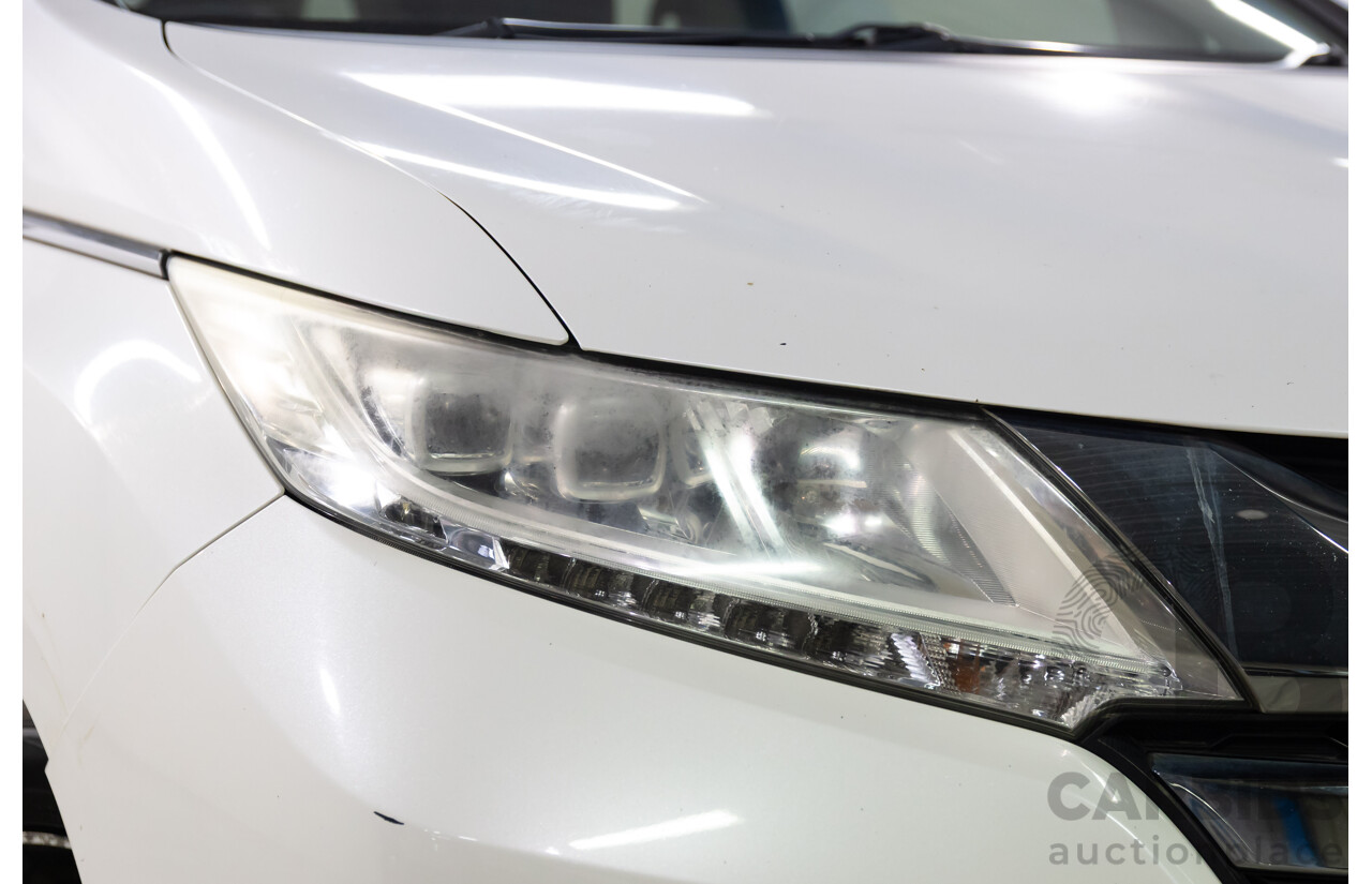 03/2016 Honda Odyssey VTi-L (FWD) RC MY16 7 Seats 4d Wagon White Diamond Pearl 2.4L - 7 Seater
