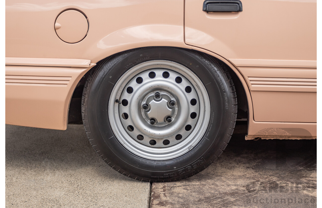 6/1988 Holden VL Commodore Executive 4d Sedan Pastel Pink Turbo 3.0L