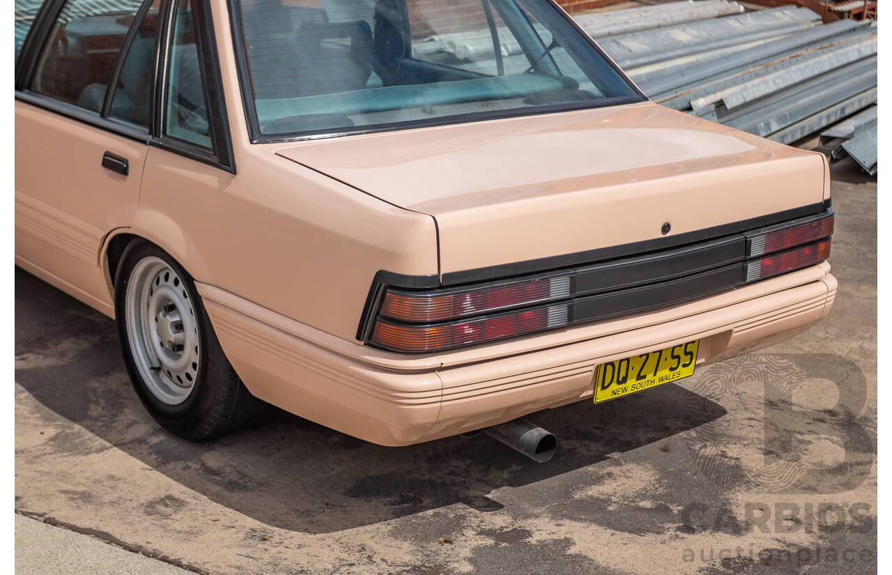 6/1988 Holden VL Commodore Executive 4d Sedan Pastel Pink Turbo 3.0L