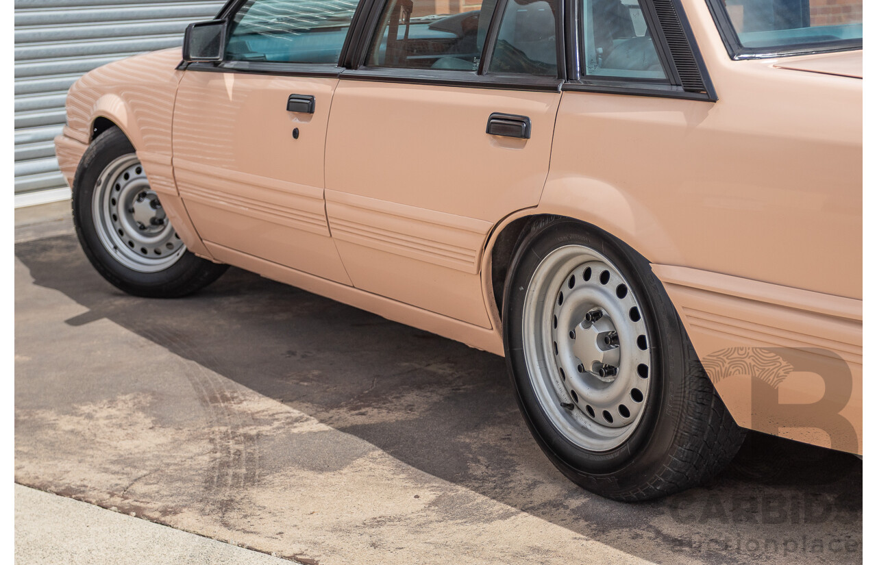 6/1988 Holden VL Commodore Executive 4d Sedan Pastel Pink Turbo 3.0L