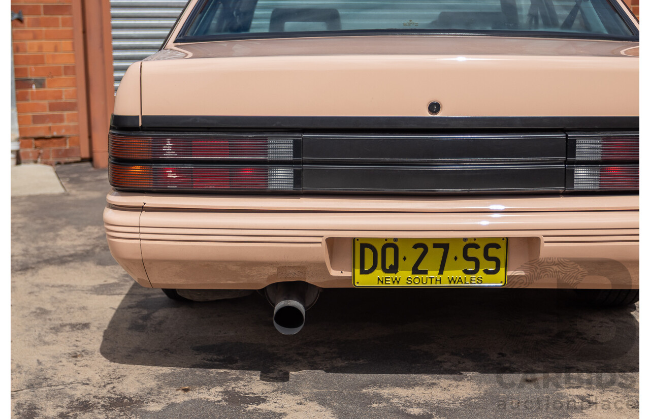 6/1988 Holden VL Commodore Executive 4d Sedan Pastel Pink Turbo 3.0L