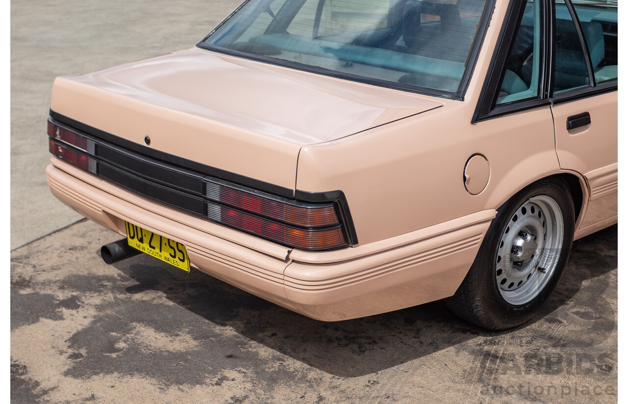 6/1988 Holden VL Commodore Executive 4d Sedan Pastel Pink Turbo 3.0L