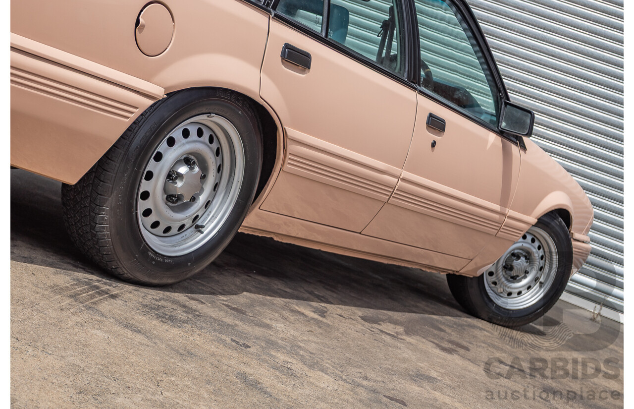 6/1988 Holden VL Commodore Executive 4d Sedan Pastel Pink Turbo 3.0L