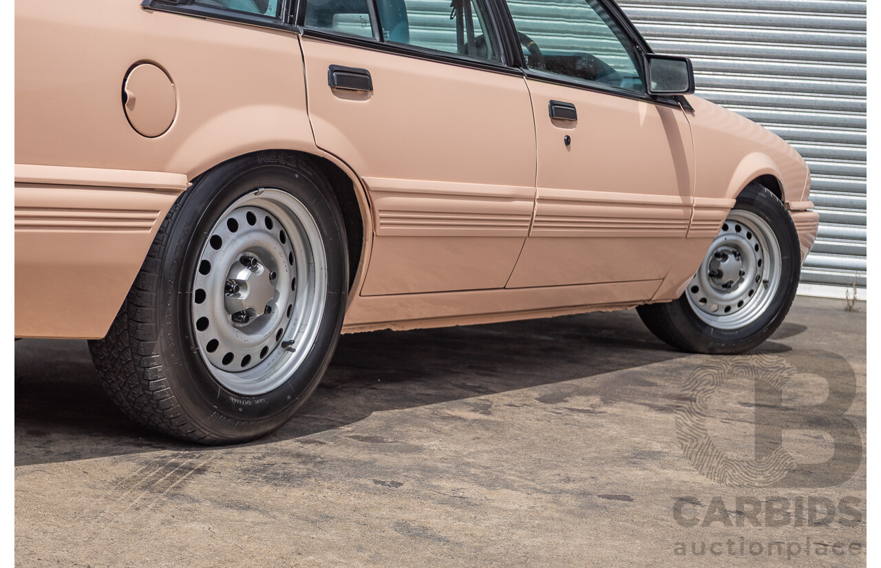 6/1988 Holden VL Commodore Executive 4d Sedan Pastel Pink Turbo 3.0L