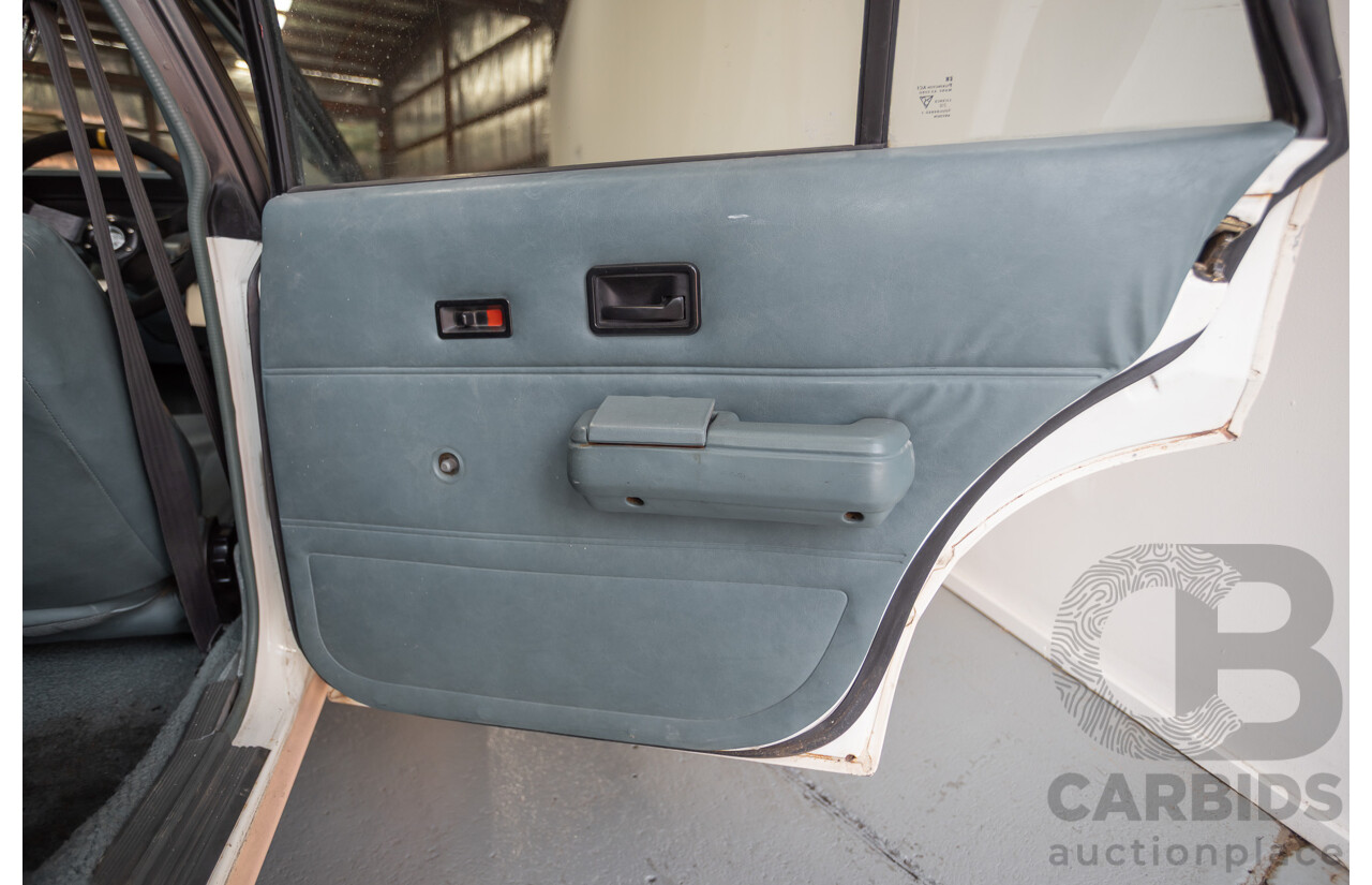 6/1988 Holden VL Commodore Executive 4d Sedan Pastel Pink Turbo 3.0L