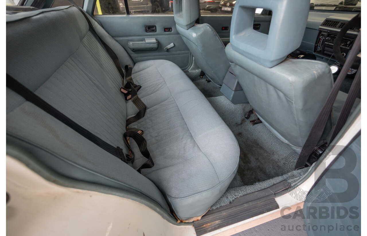 6/1988 Holden VL Commodore Executive 4d Sedan Pastel Pink Turbo 3.0L