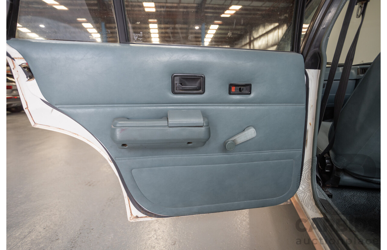 6/1988 Holden VL Commodore Executive 4d Sedan Pastel Pink Turbo 3.0L