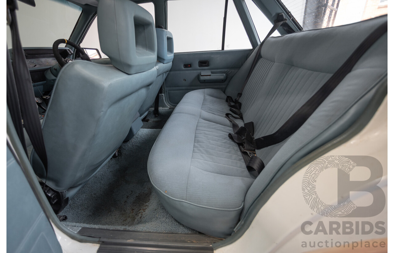 6/1988 Holden VL Commodore Executive 4d Sedan Pastel Pink Turbo 3.0L