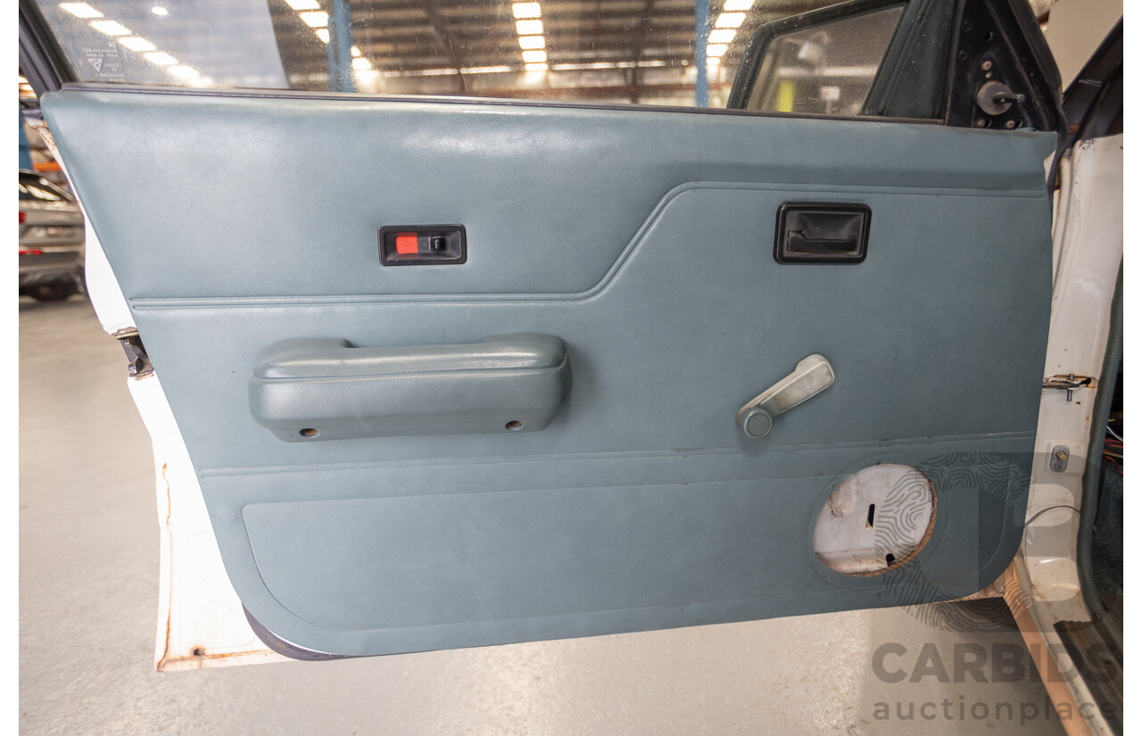 6/1988 Holden VL Commodore Executive 4d Sedan Pastel Pink Turbo 3.0L