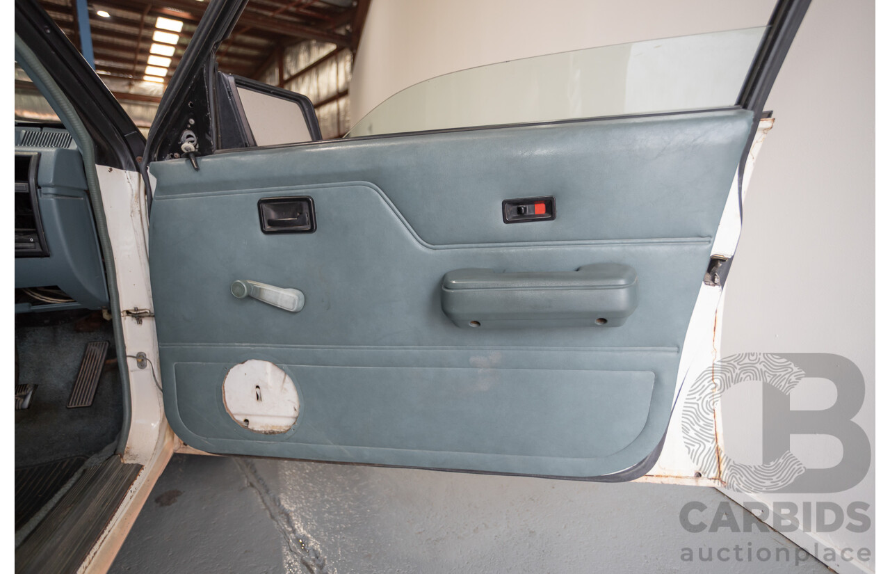 6/1988 Holden VL Commodore Executive 4d Sedan Pastel Pink Turbo 3.0L