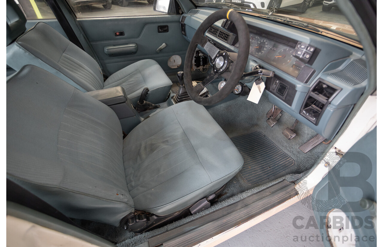 6/1988 Holden VL Commodore Executive 4d Sedan Pastel Pink Turbo 3.0L