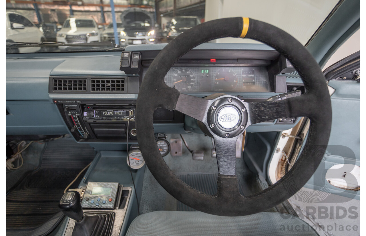 6/1988 Holden VL Commodore Executive 4d Sedan Pastel Pink Turbo 3.0L